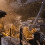 Voyage insolite suisse : cabane sur pilotis en Suisse au coucher du soleil